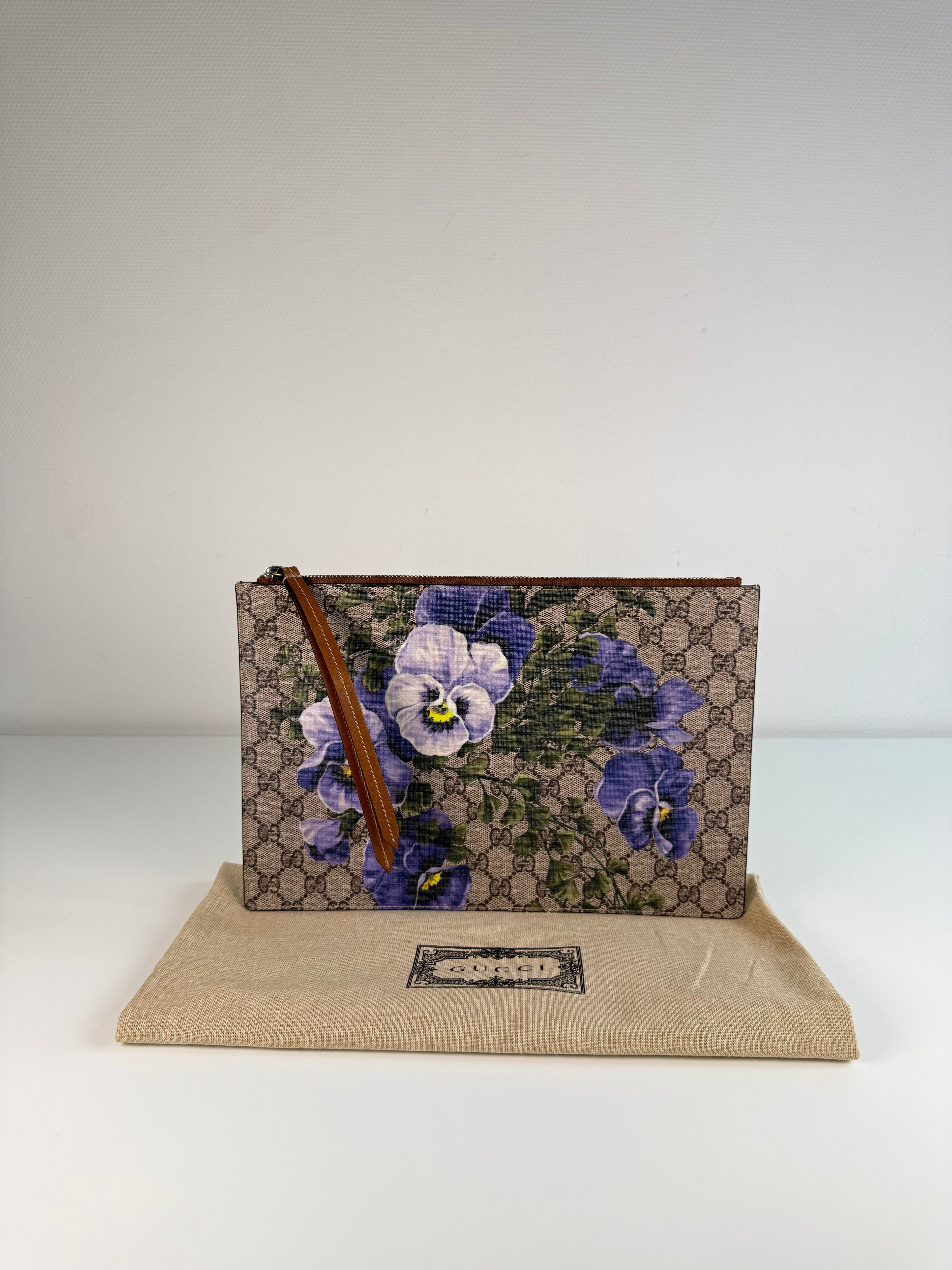 Pochette fleuri monogramme Gucci