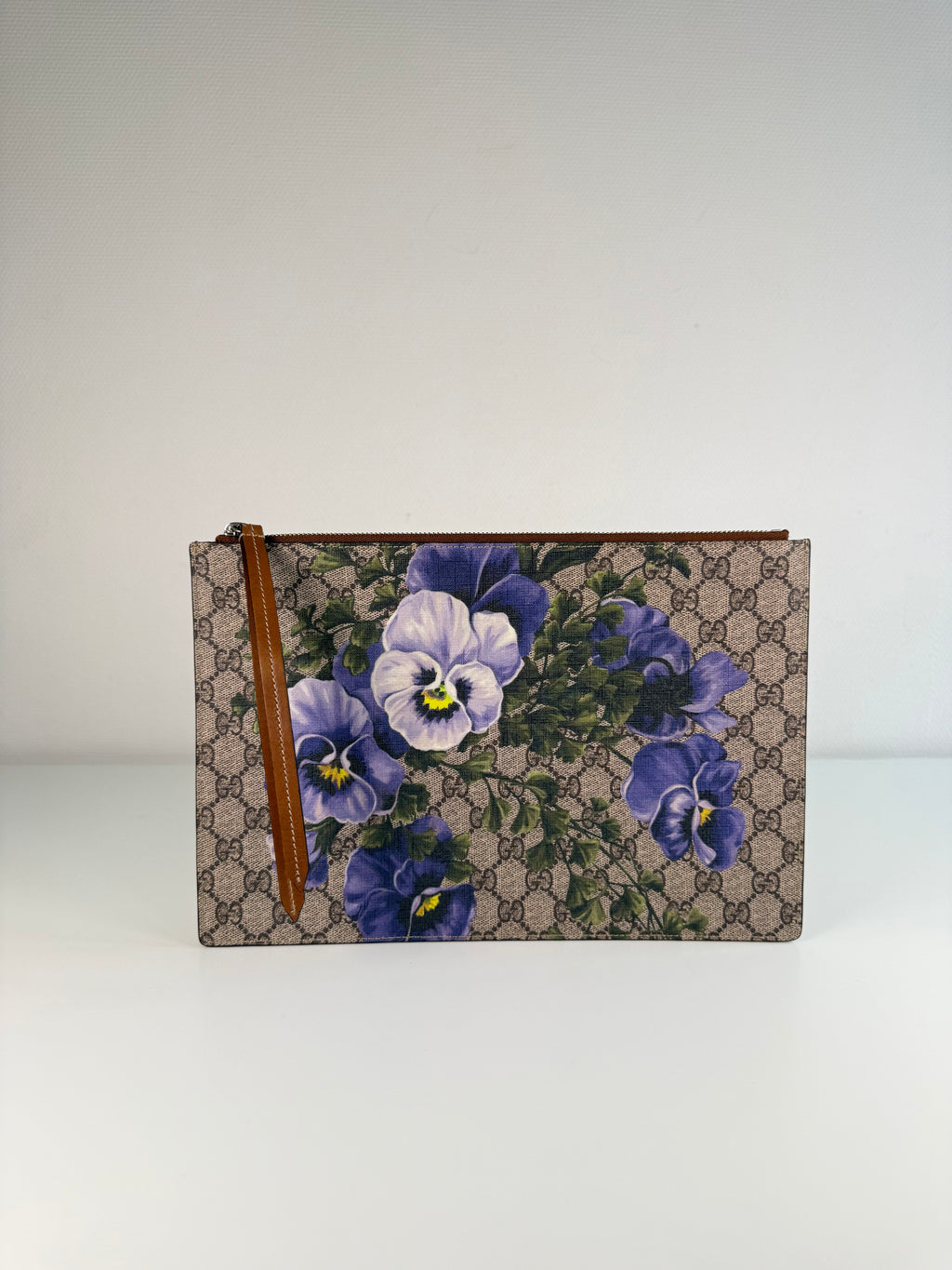 Pochette fleuri monogramme Gucci