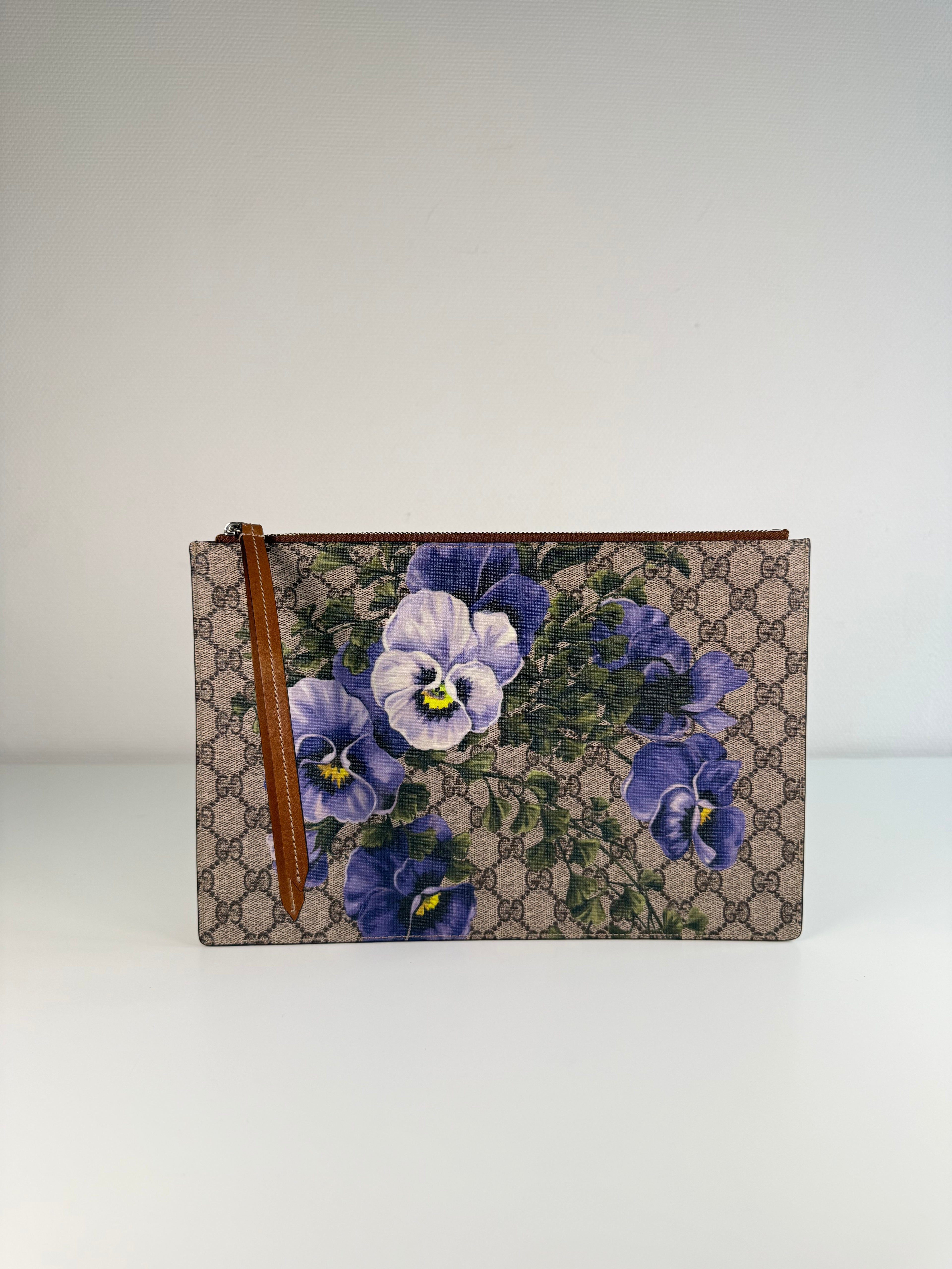 Pochette fleuri monogramme Gucci