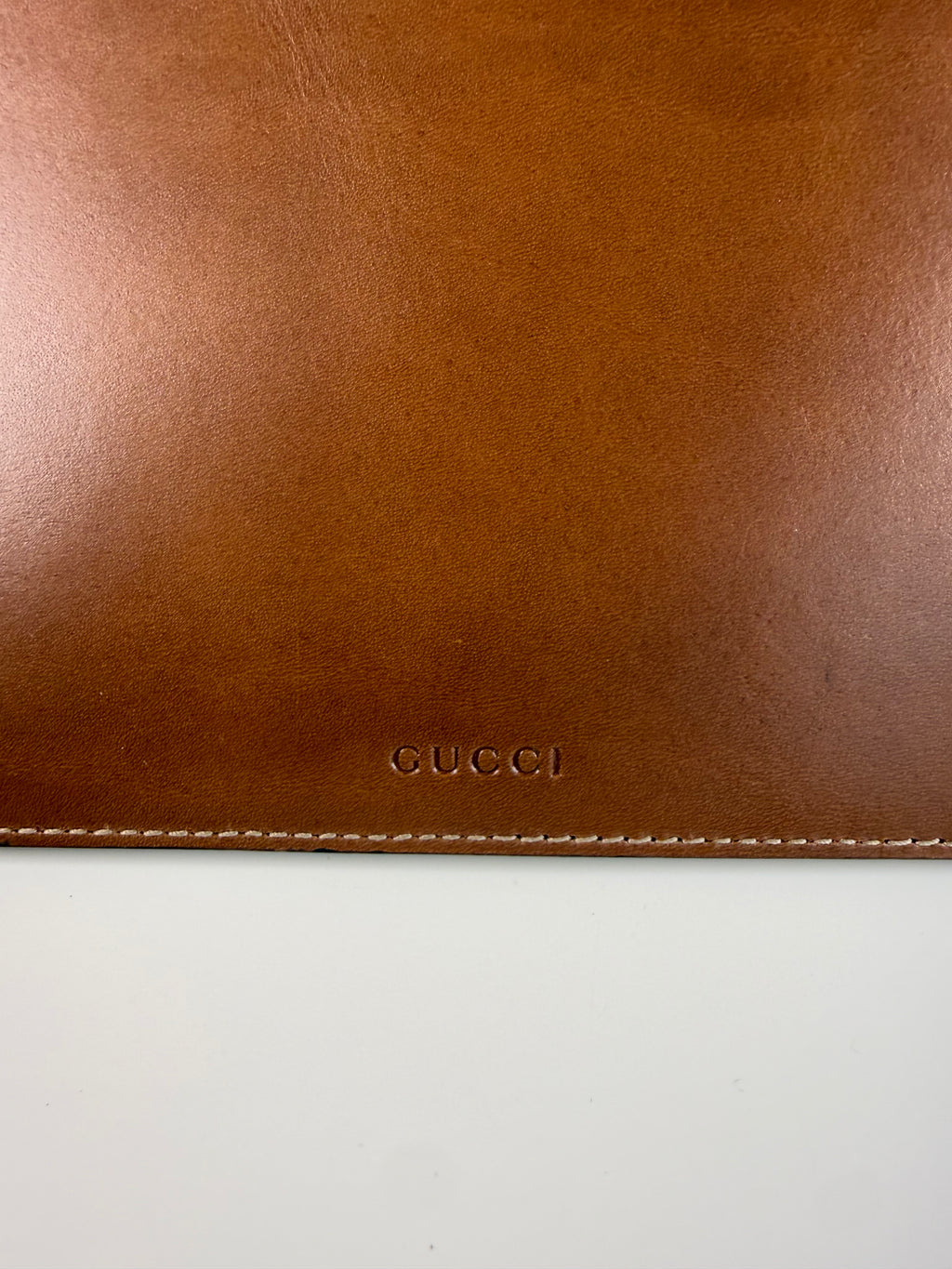 Pochette fleuri monogramme Gucci
