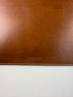 Pochette fleuri monogramme Gucci