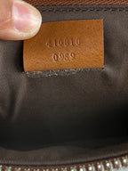 Pochette fleuri monogramme Gucci