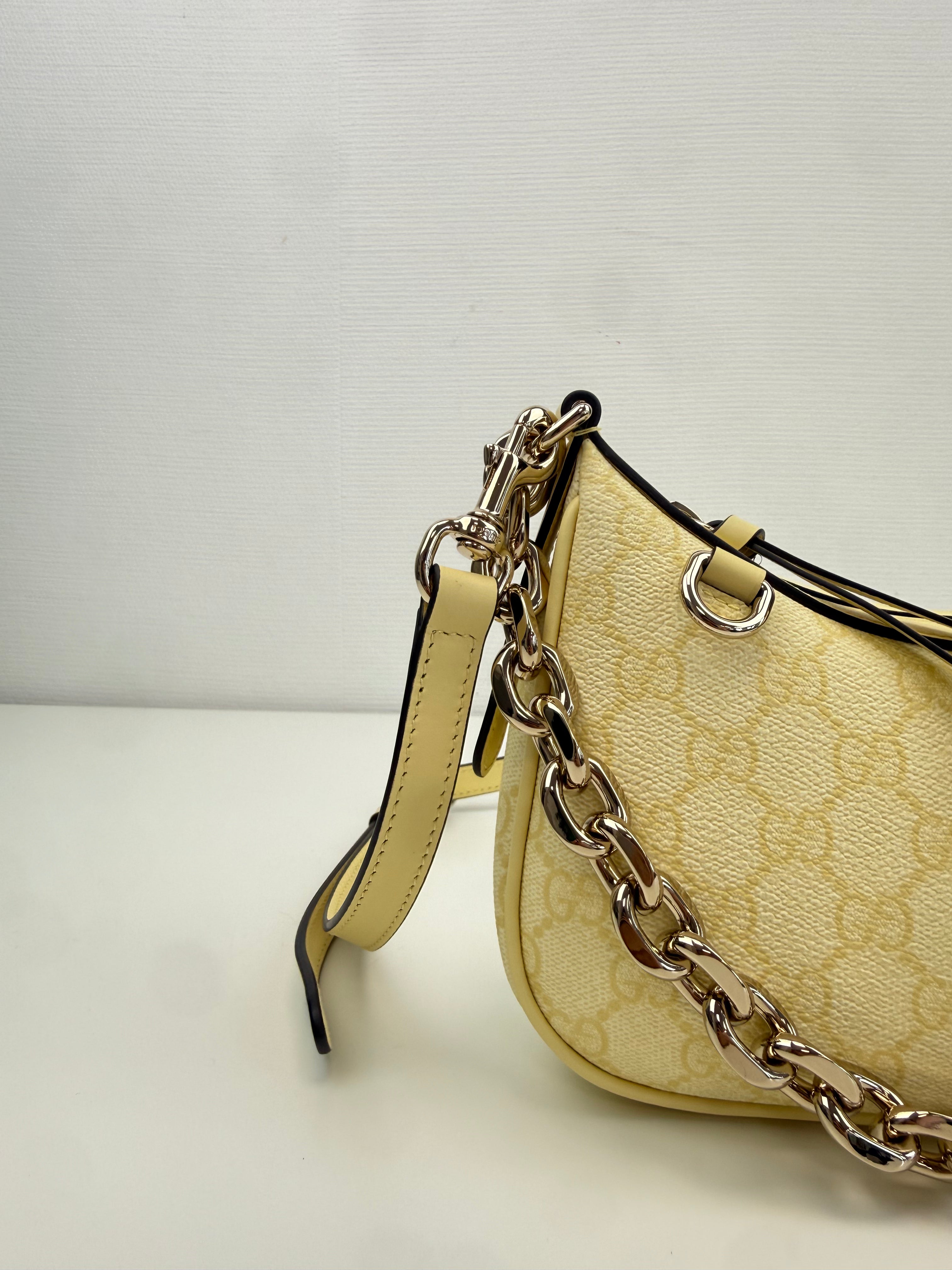 GG Emblem small shoulder bag Gucci