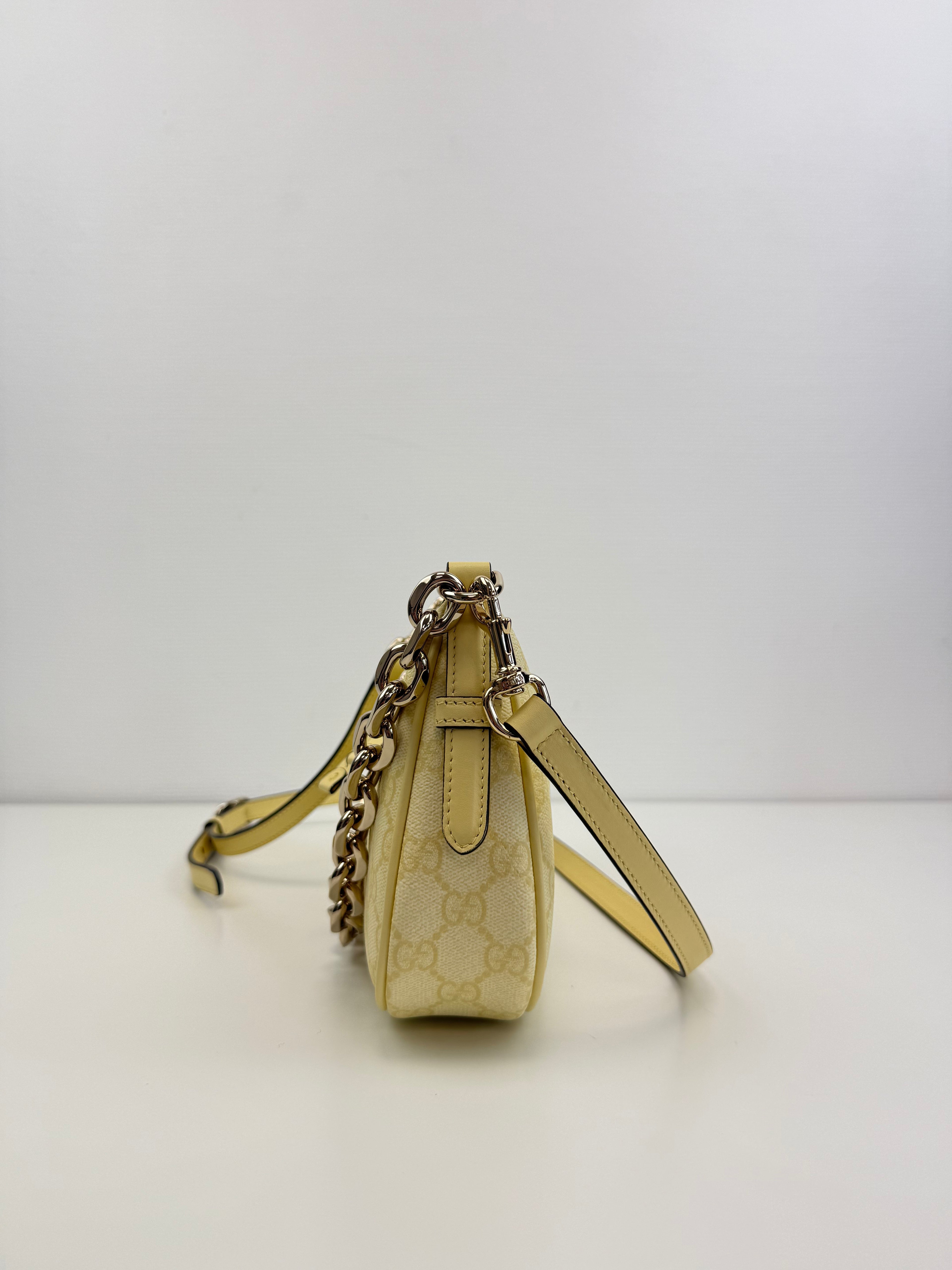 GG Emblem small shoulder bag Gucci