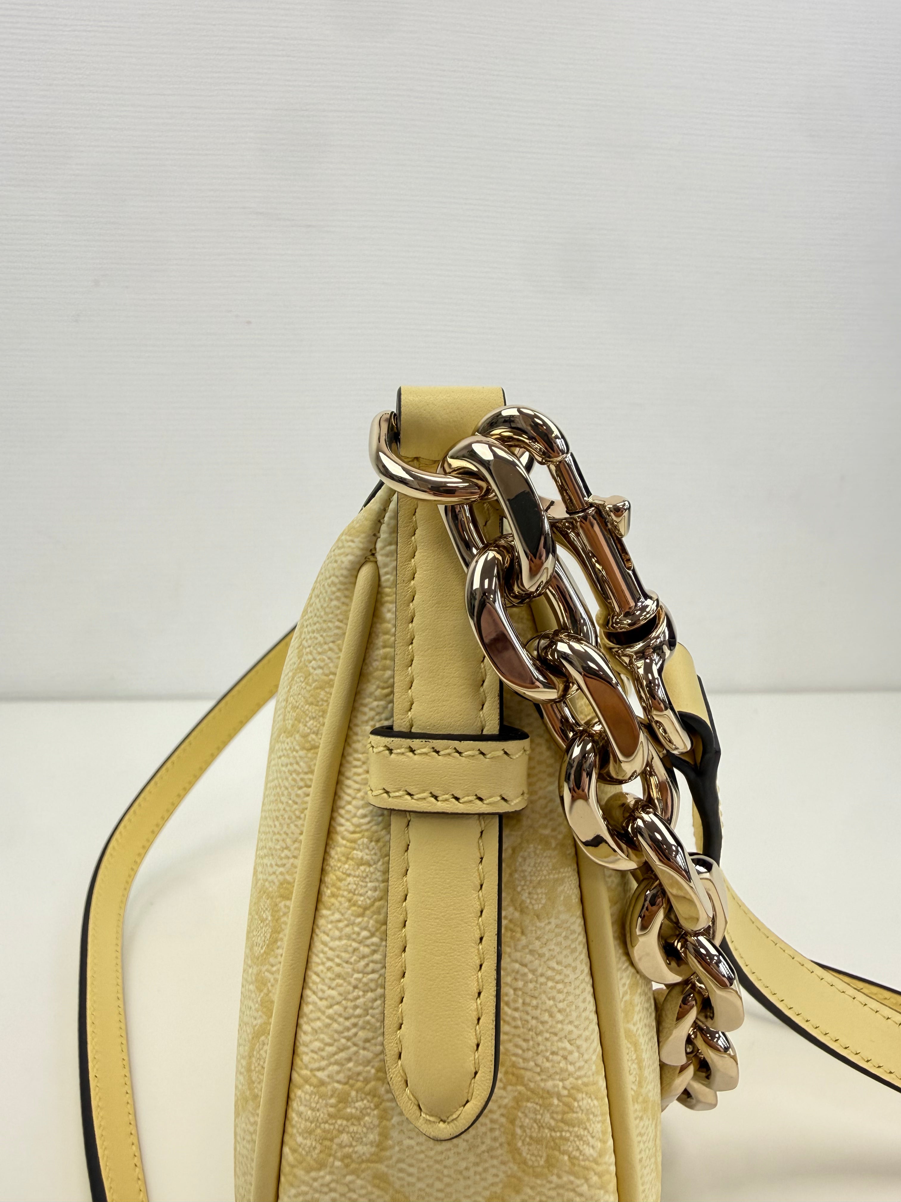 GG Emblem small shoulder bag Gucci