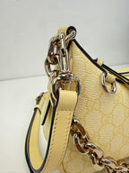 GG Emblem small shoulder bag Gucci