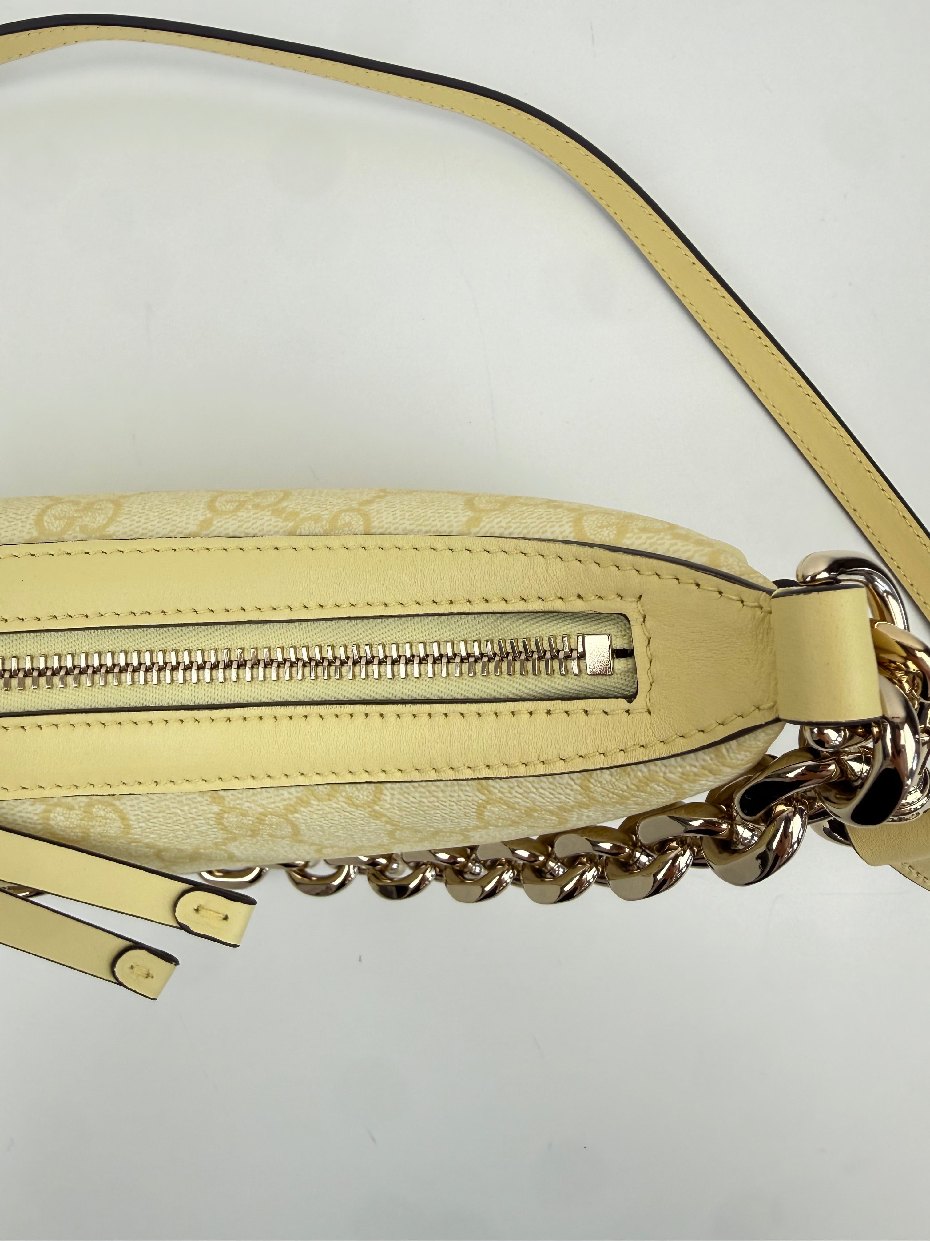 GG Emblem small shoulder bag Gucci