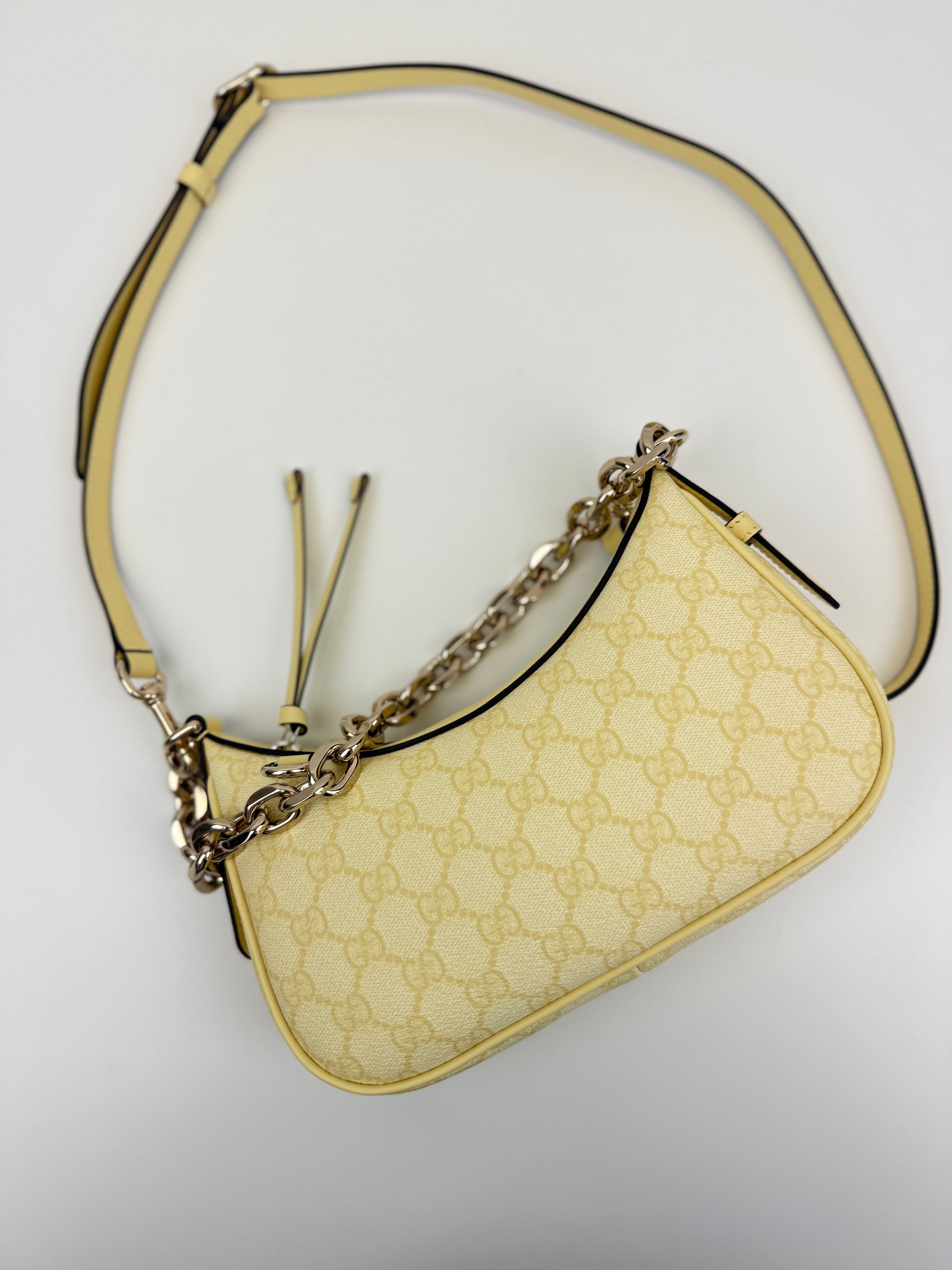 GG Emblem small shoulder bag Gucci