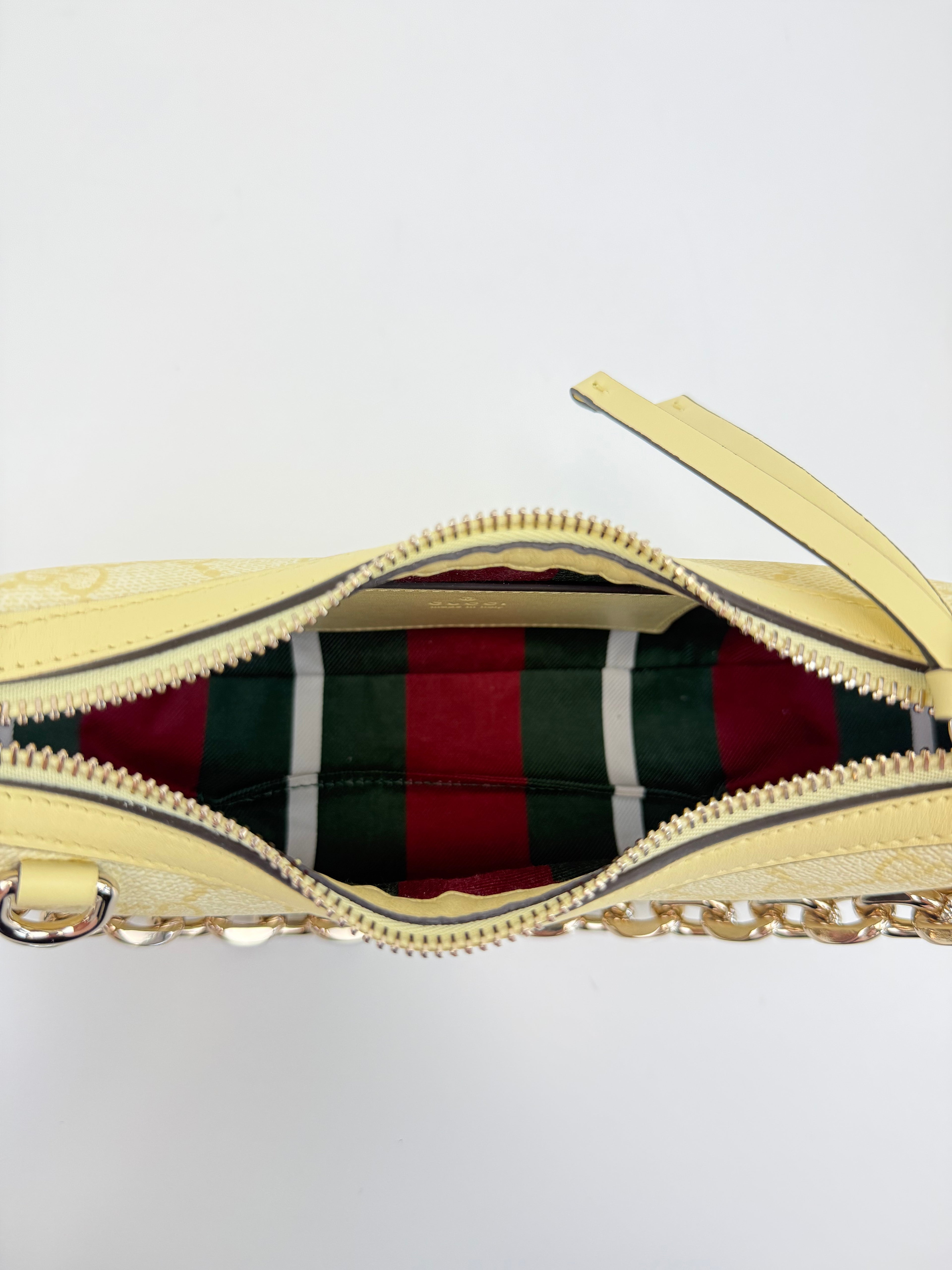 GG Emblem small shoulder bag Gucci